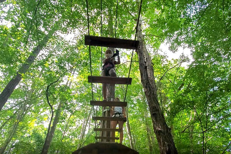 person on a zip line course