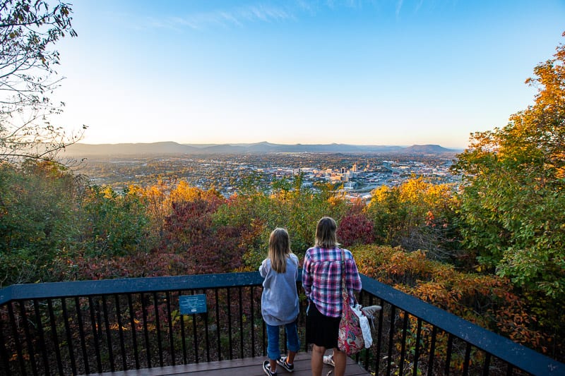 woman and girl looking over the Fall colors of Roanoke Virginia