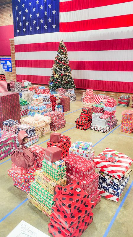 floor filled with wrapped christmas presents
