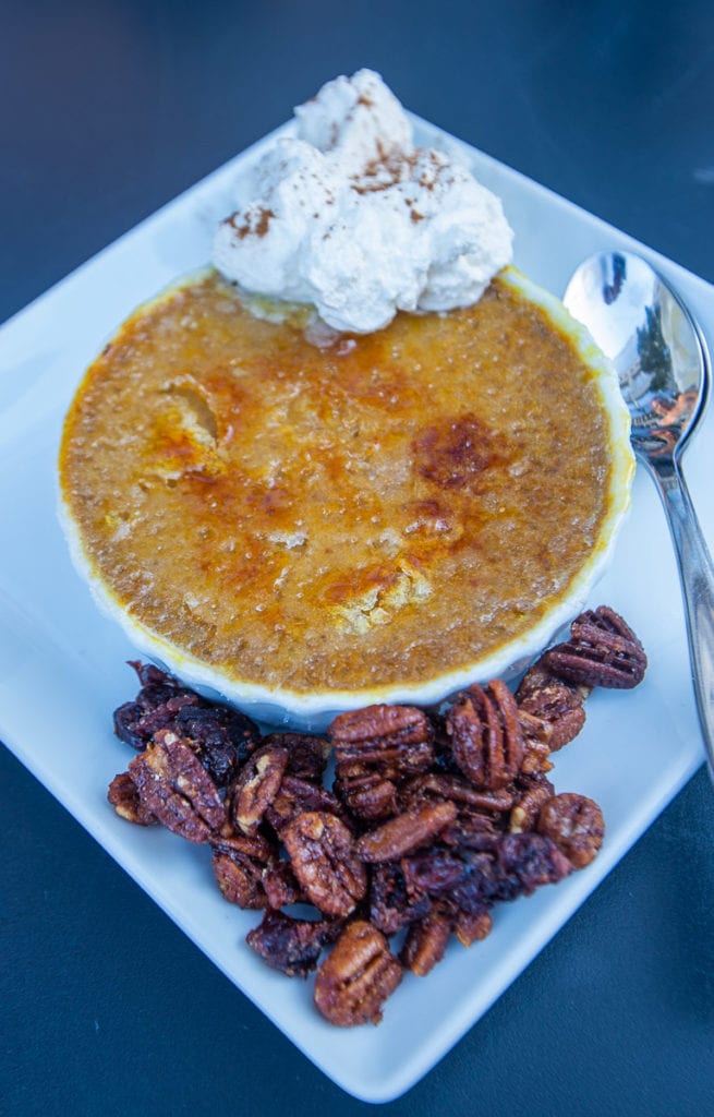 pumpkin brulee with candied pecans on a plate at Bittersweet, Raleigh, NC