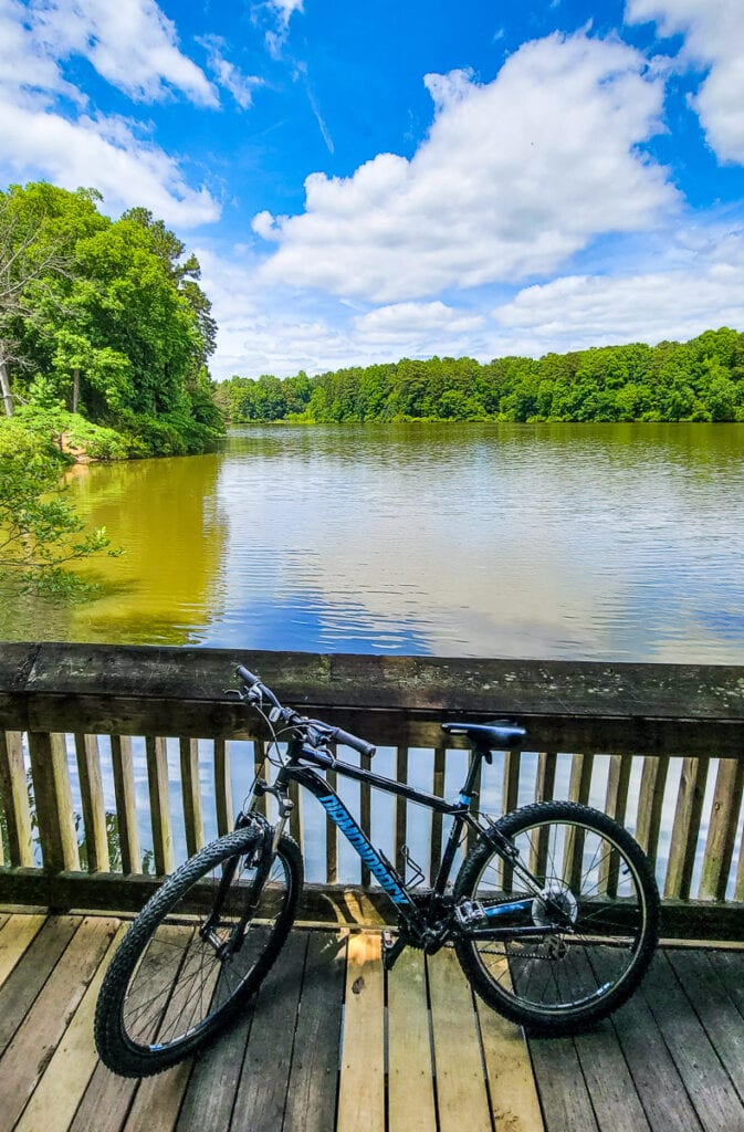 a bike in front of a body of water