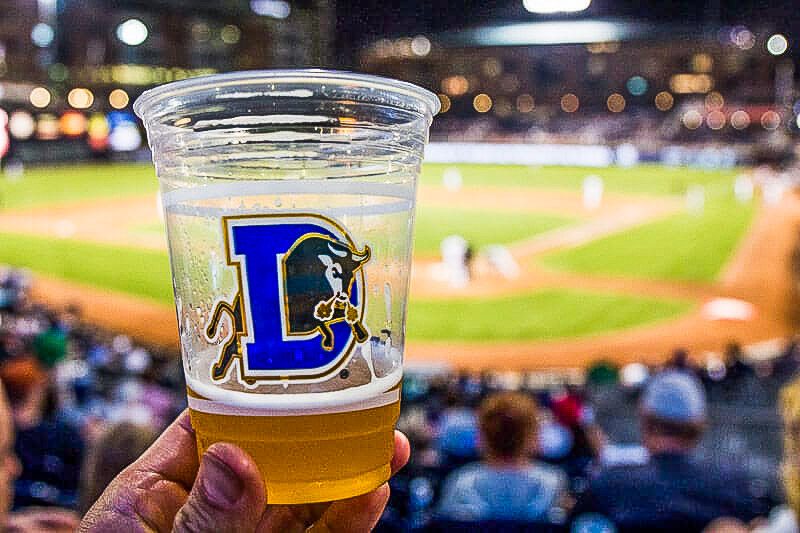 Cup of beer in plastic cup with D on it Durham Bulls baseball game
