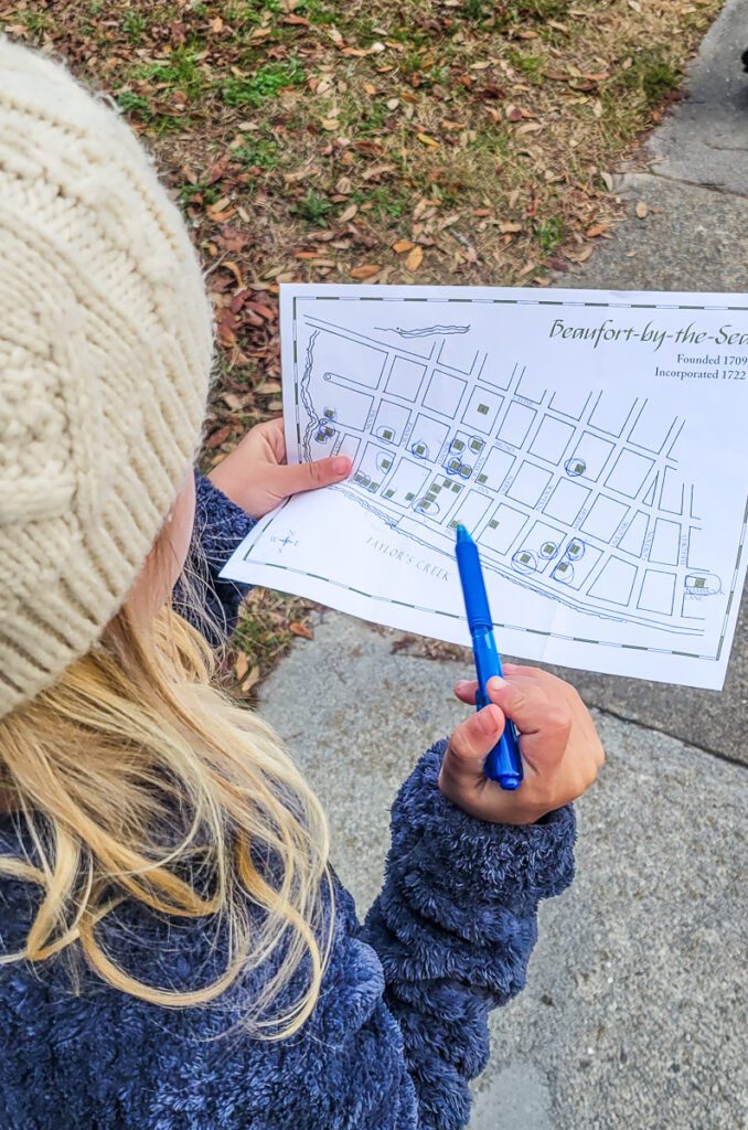 a girl holding a map