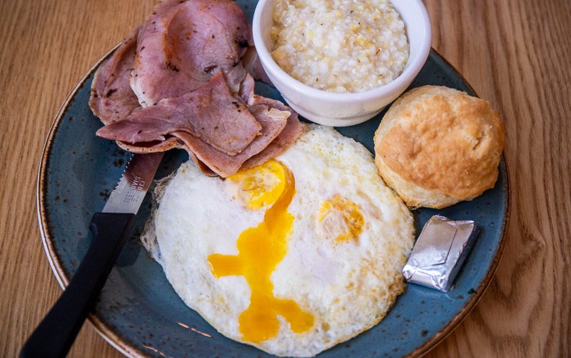 Country ham goes well with eggs, grits, and a biscuit
