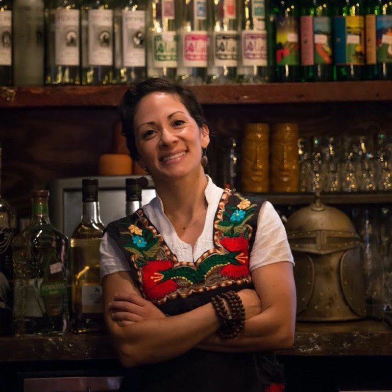 a bartender posing for the camera
