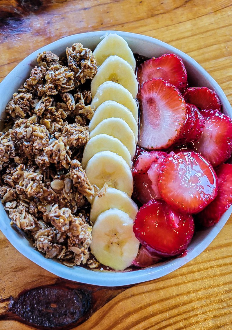 A bowl of fruit and granola