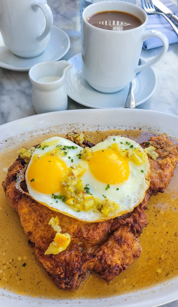 plate of fried pork and eggs