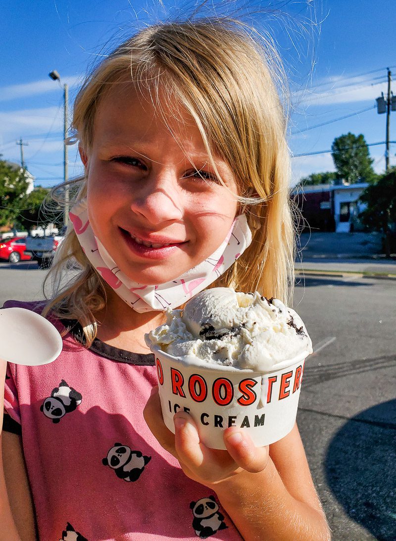 Child eating ice cream at Two Roosters Ice Cream in Raleigh