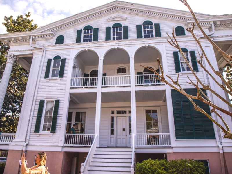 Front of a white historic Southern mansion