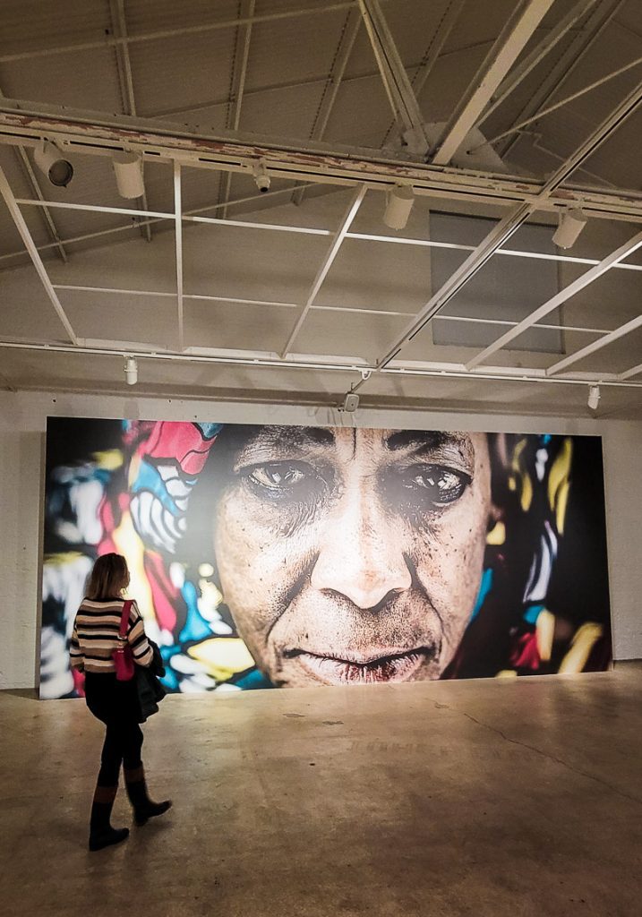 Portrait painting of a black women in an art museum
