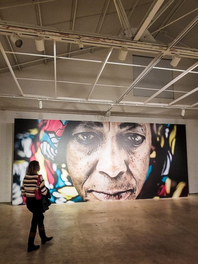 Portrait painting of a black women in an art museum