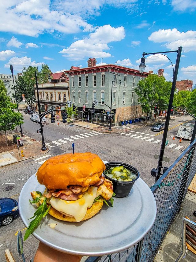 Hamburger with city views in the background