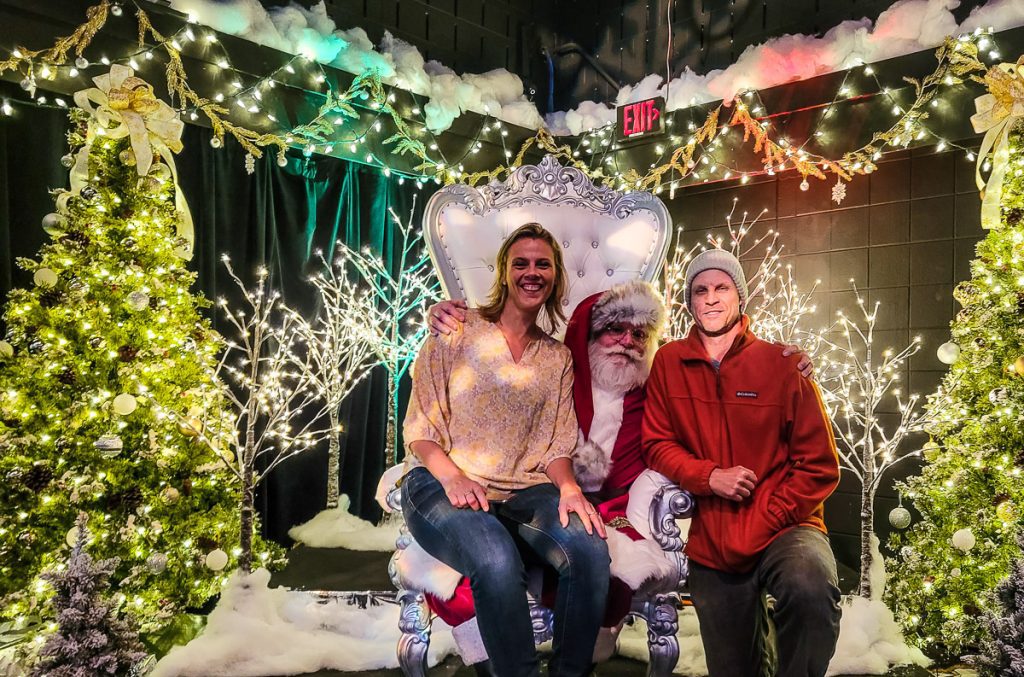 Couple getting their photo with Santa