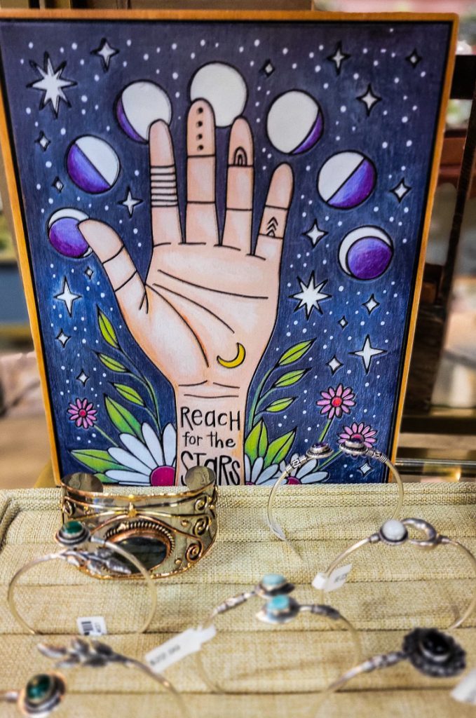 Painting of a hand with jewelry