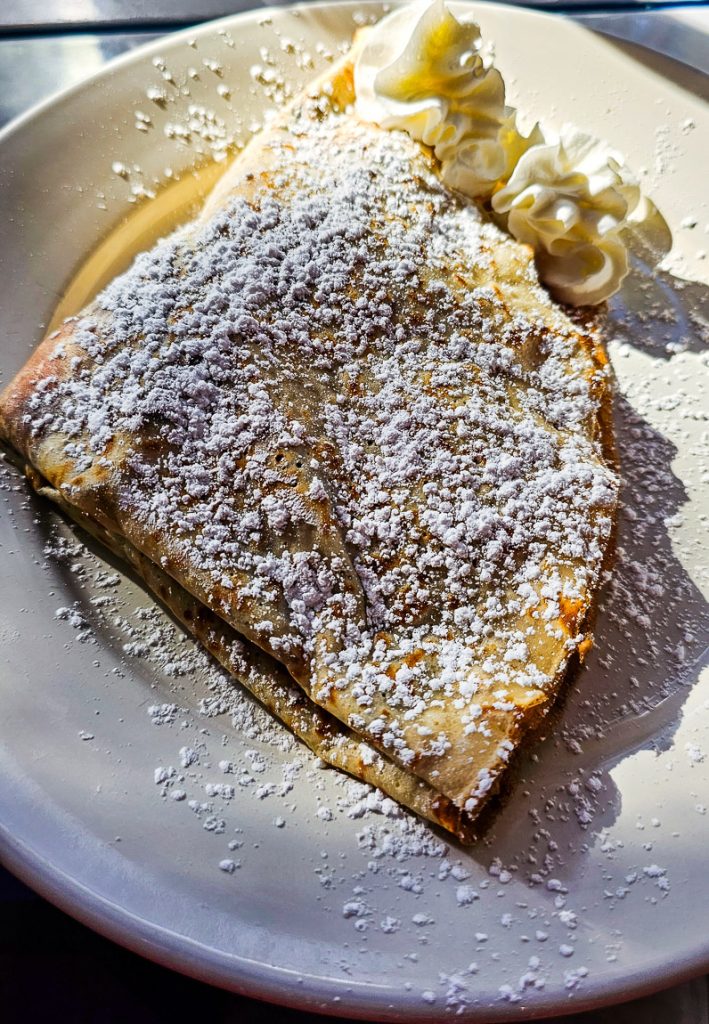 Crepe with creme on a plate