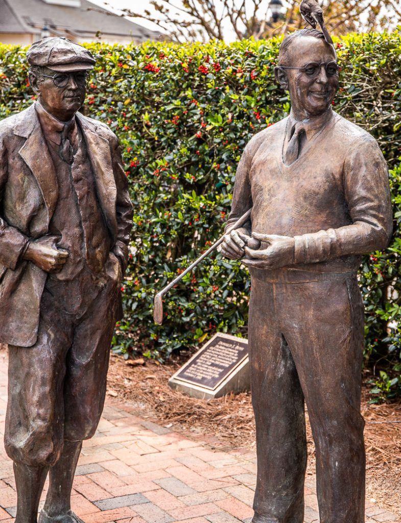 Two statues of famous golfers
