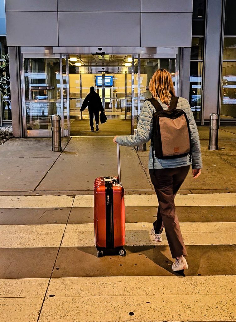 Woman entering an airport