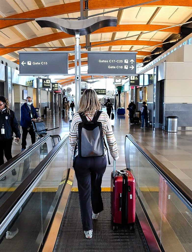 Lady walking through airport