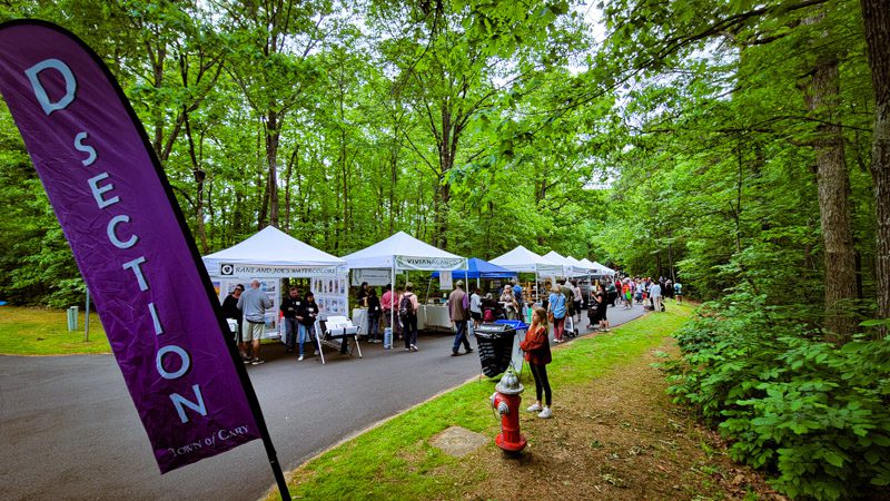 artisan stalls on the road in a forest at spring daze