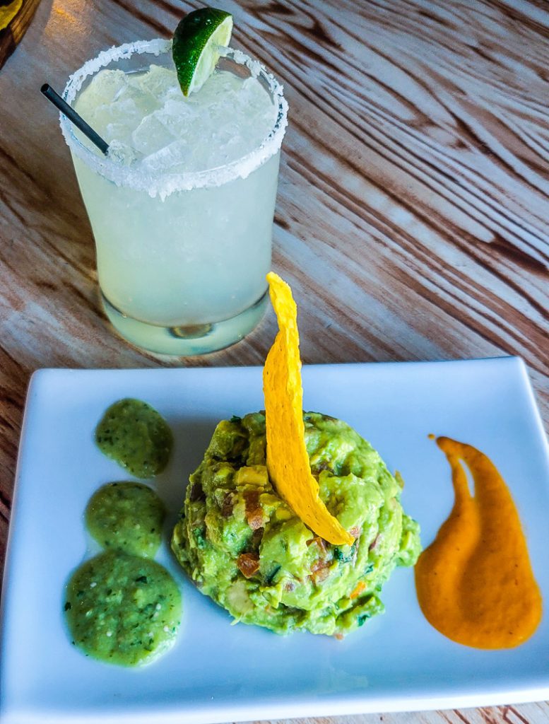 Plate of guacamole and a Margarita