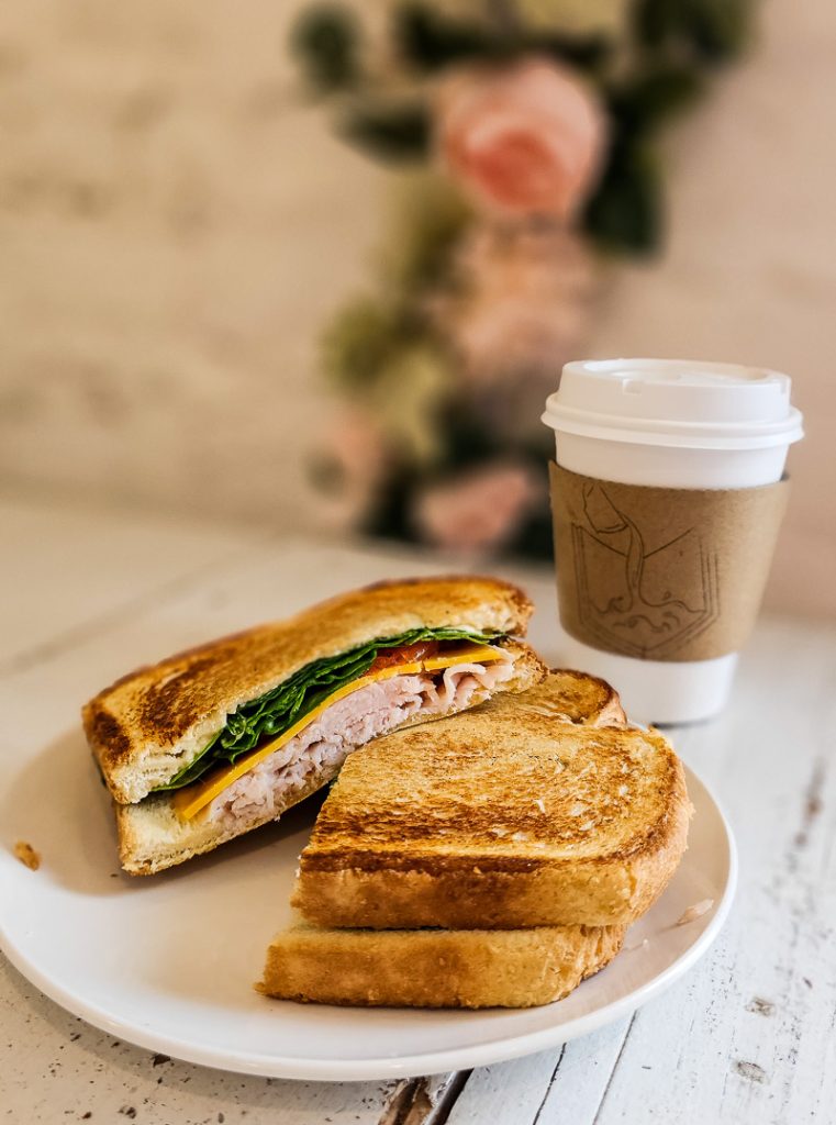 Toasted turkey sandwich and coffee