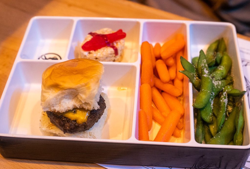 Bento Box of a mini burger and sushi at Cowfish in North Hills