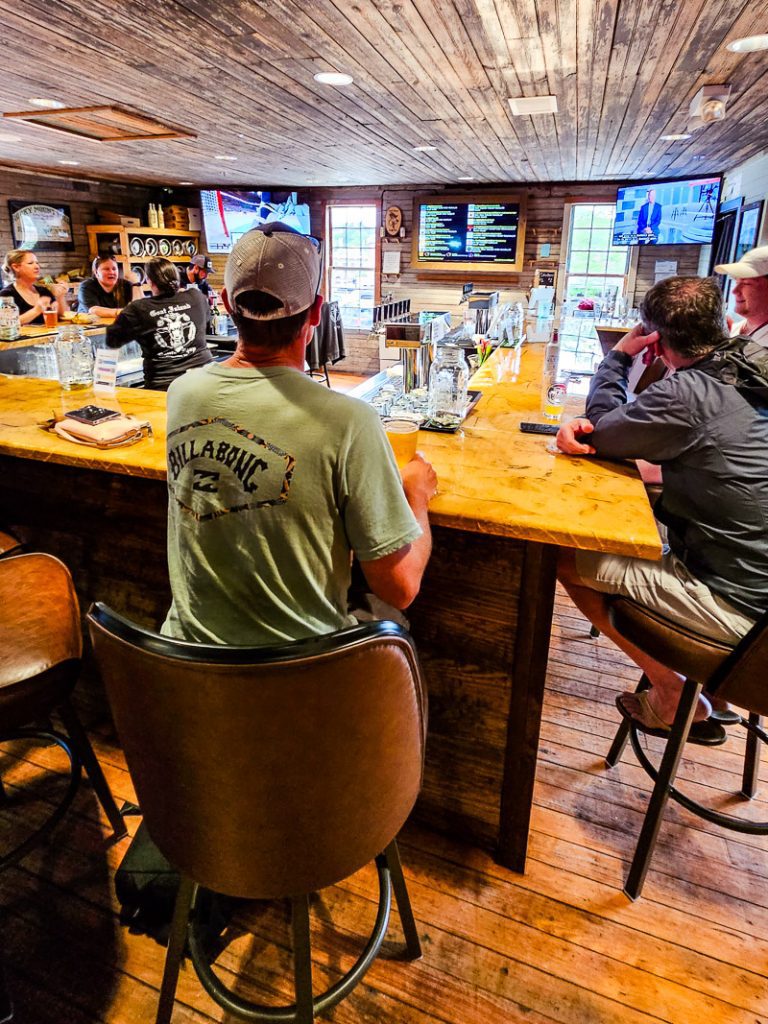 Man sitting at a bar drinking beer