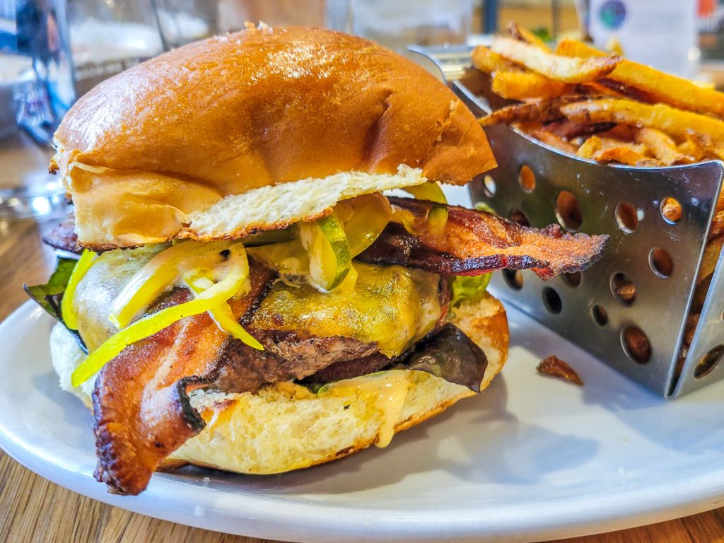 Burger with bacon and cheese and fries