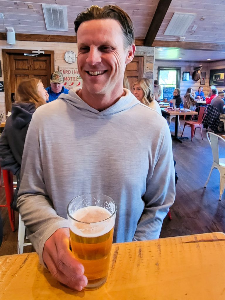 Man holding a glass of beer