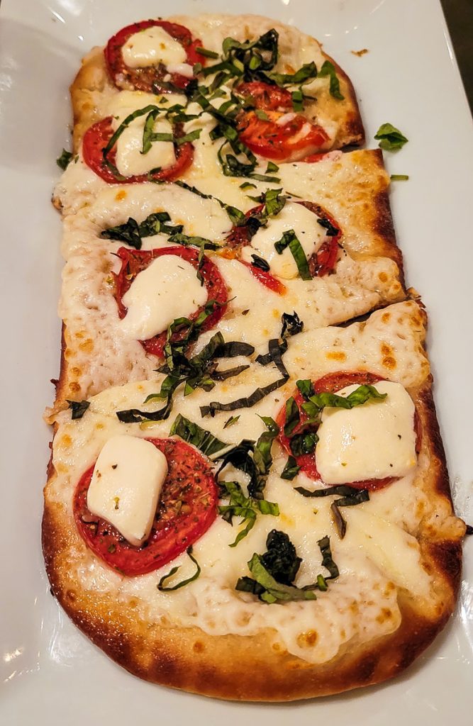 Flatbread with tomatoes and cheese