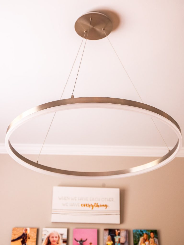 Circular ceiling light hanging from a ceiling