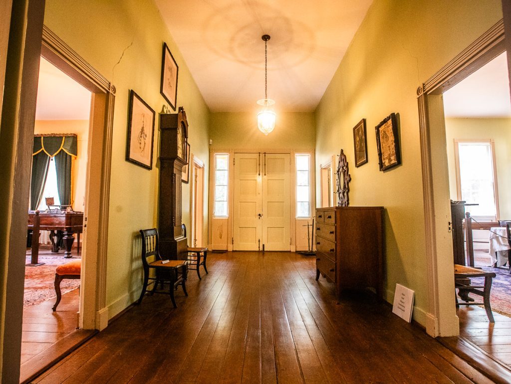 Hallway with antique furniture on display