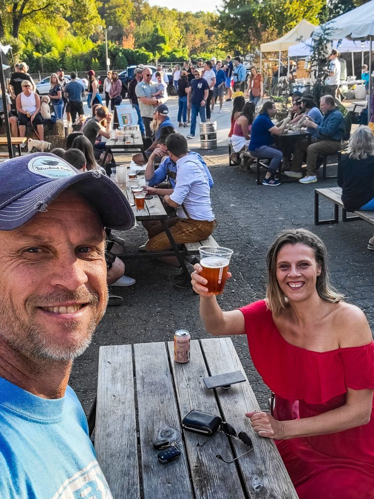 Man and woman drinking at a brewery