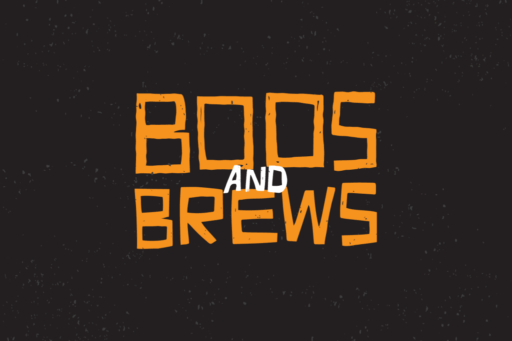 Sign with the words Boos and Brews written on it.