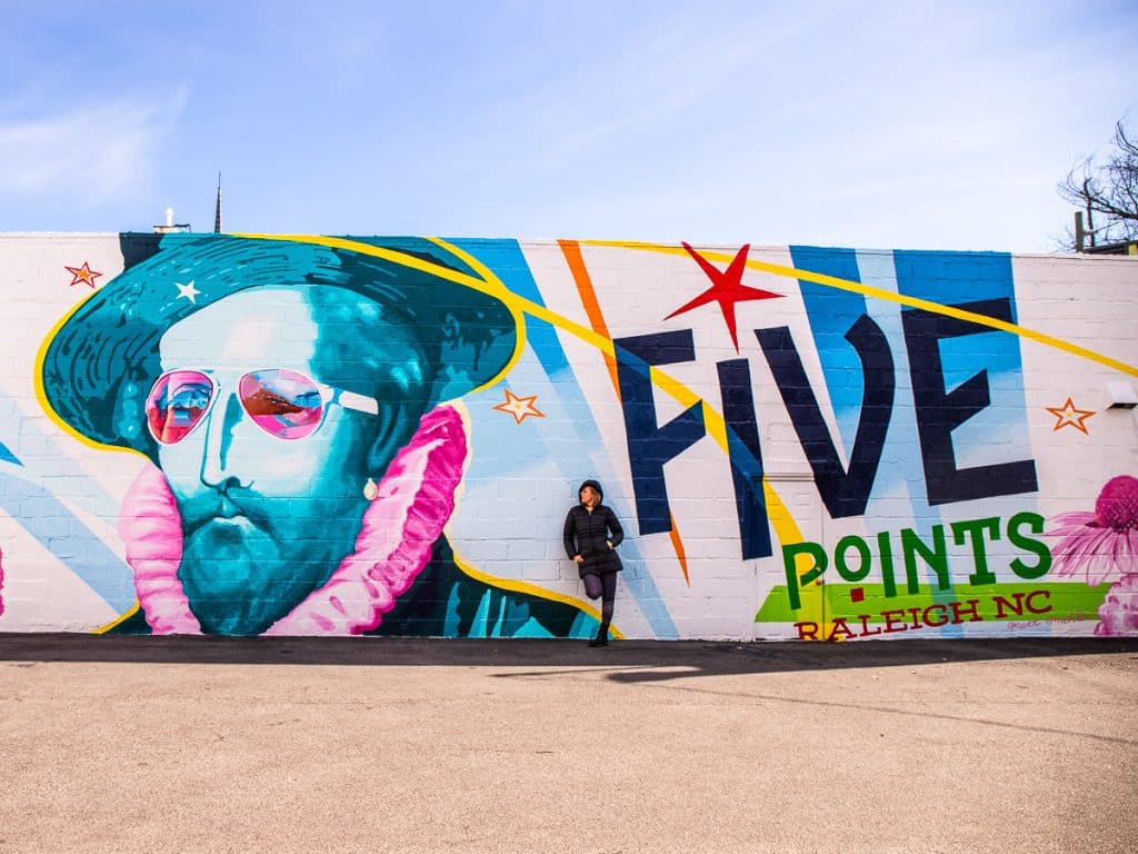 Mural with an image of a man and the words Five Points.